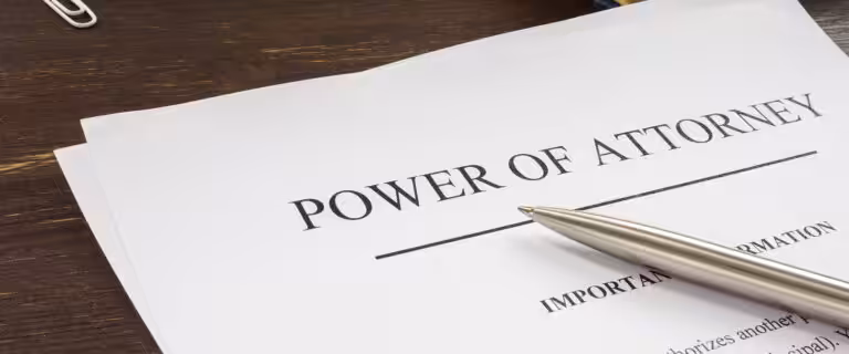 Power of attorney legal document with pen