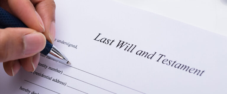 Person signing a Last Will and Testament representing Death Law