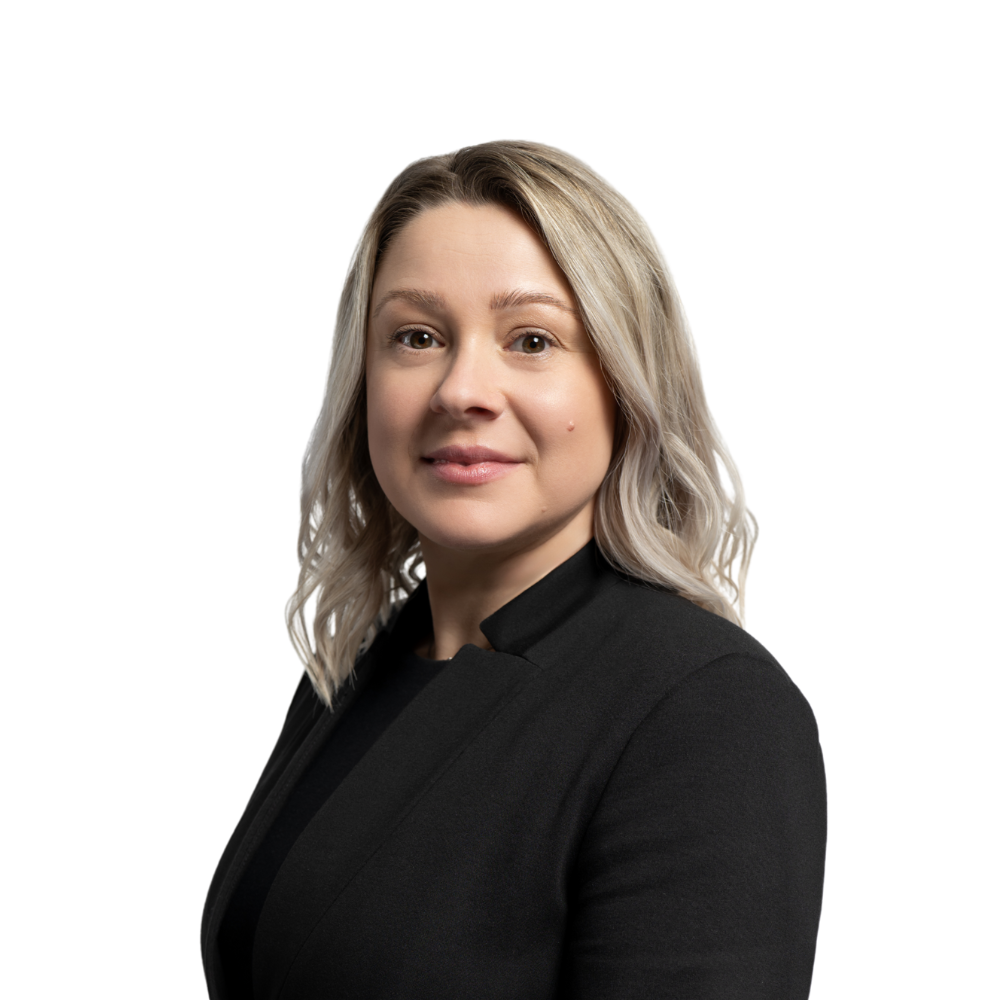 Professional woman in black blazer portrait
