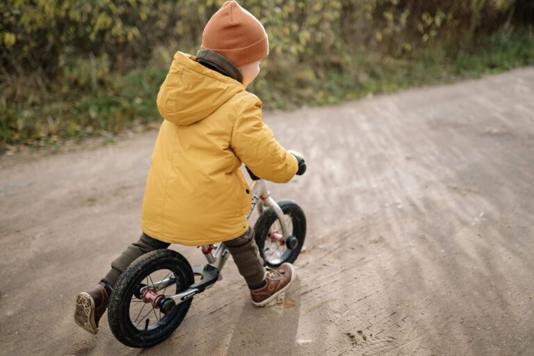 Young child playing with a small bike, representing family law matters