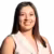 Smiling woman in professional beige outfit