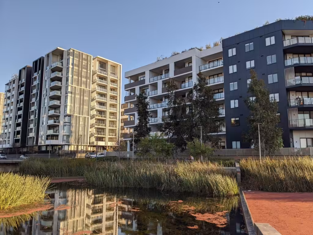 Scenic view of a Western Sydney location with modern buildings and open grassy areas