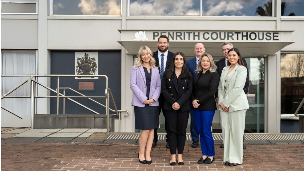 Group of professionals outside Penrith Courthouse Australia