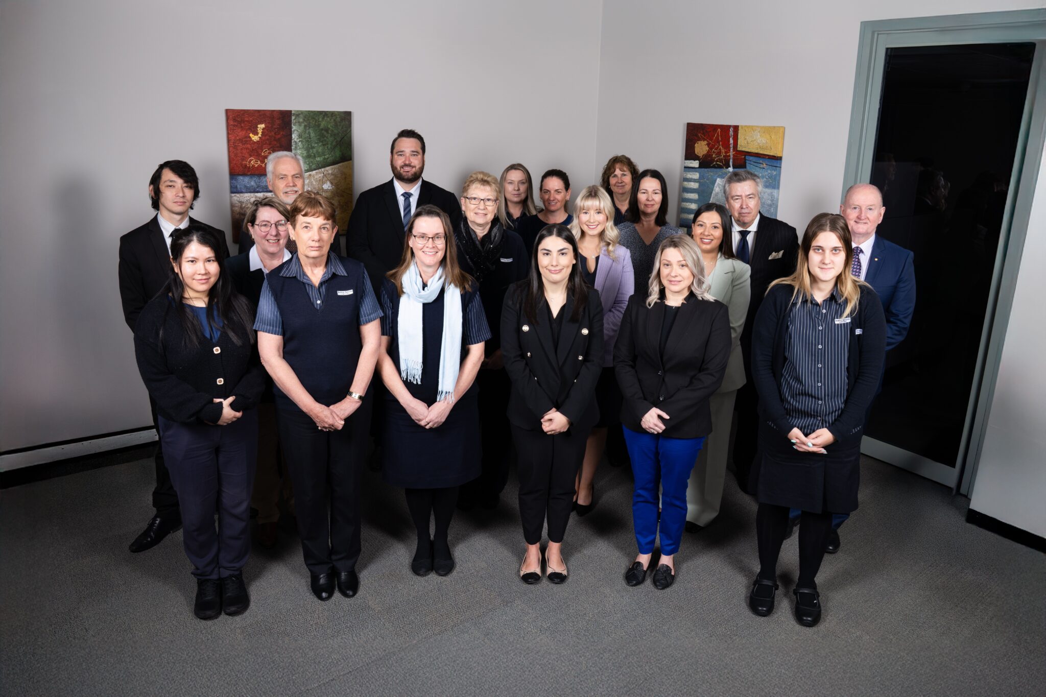 Professional team group photo in office setting
