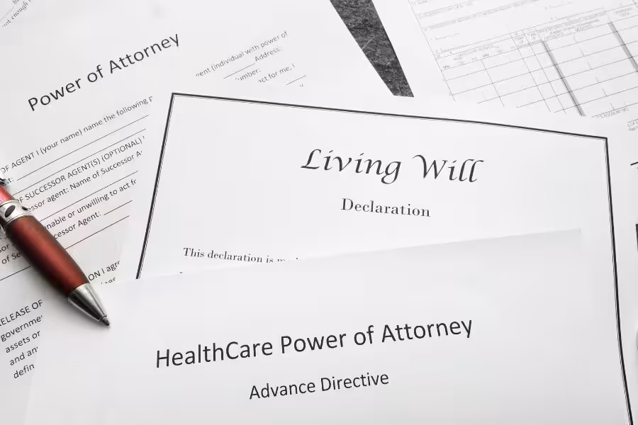 Signed legal papers with a pen on the side